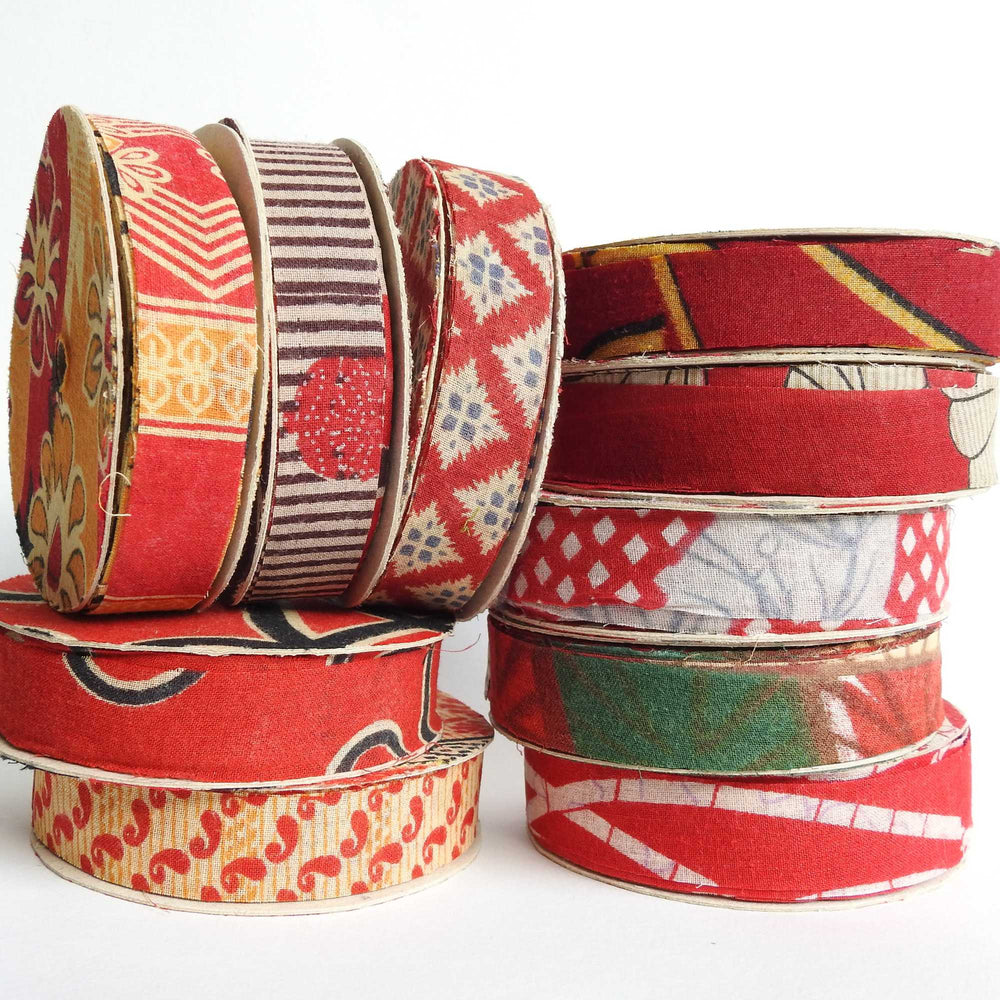 
                  
                    spools of upcycled sari cotton for weaving, baskets, trim, hair, hats, bags. Assorted colours and patterns. Crafted from upcycled sari cotton.
                  
                