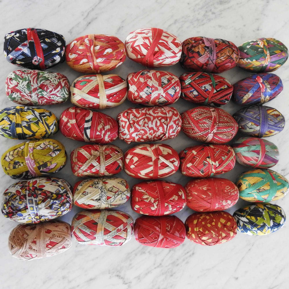 
                  
                    Upcycled Sari Cotton ribbon for wrapping, hair tie, flowers, weaving, basket making, sewing trim. Fair trade and upcycled materials. Hand crafted recycled yarn. Weaving, Knitting, Crochet
                  
                