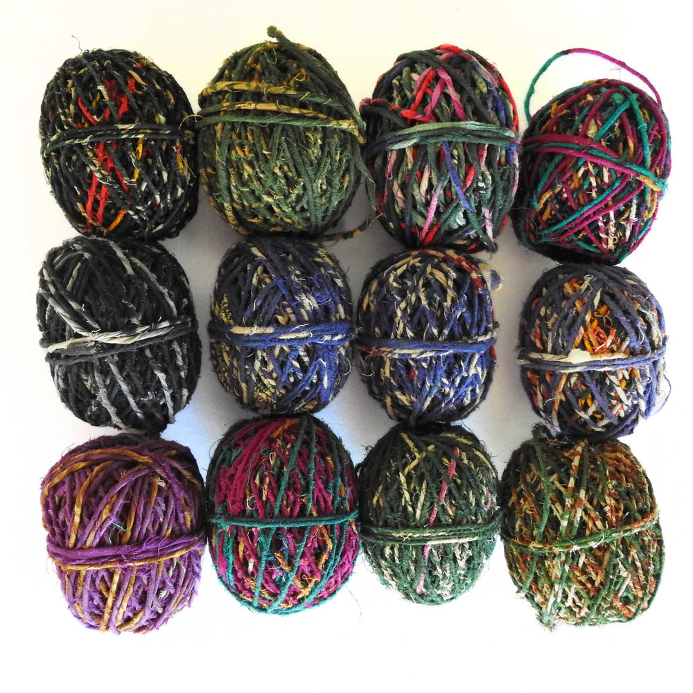 Balls of upcycled cotton sari twine. Handmade from cotton saris. Use for weaving, jewellry, crafts, macrame, knitting, crochet, piping cord. Ecofriendly vegan yarn 25m