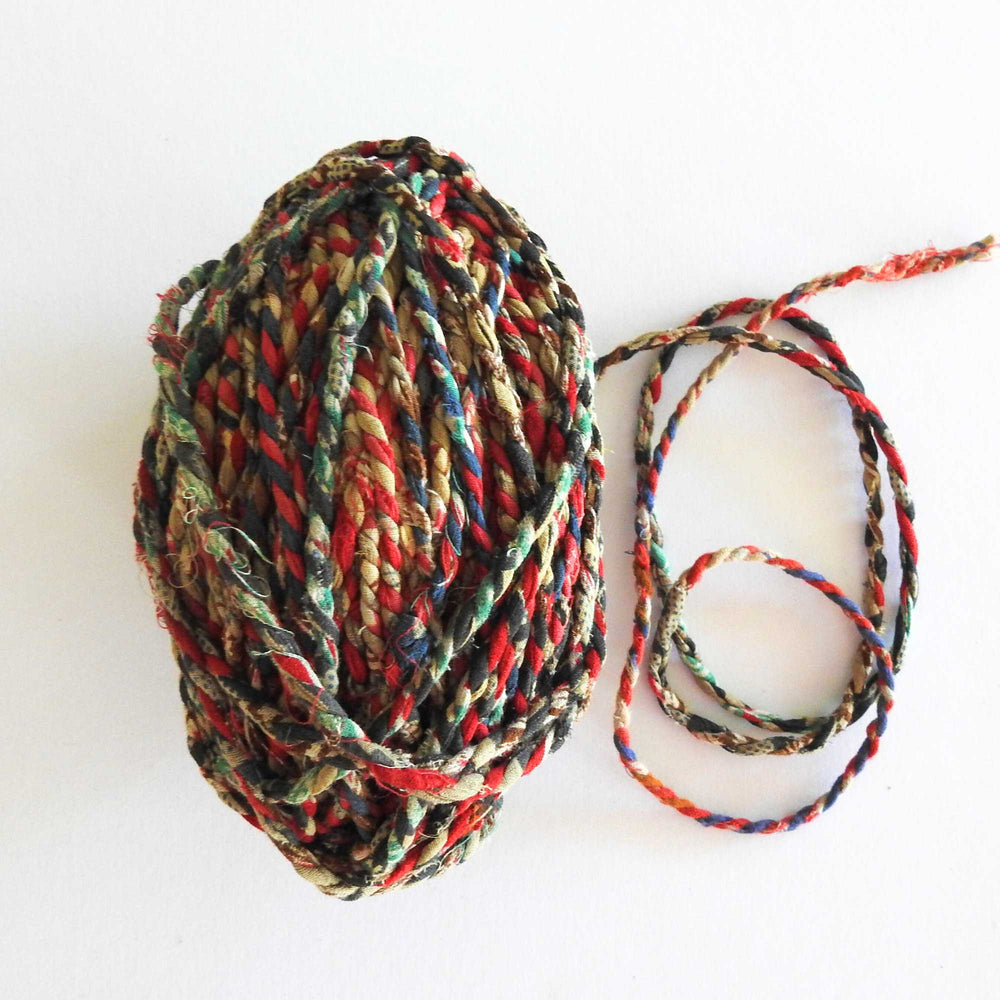 
                      
                        Ball of fairtrade recycled cotton cord in Green Blue. Soft Cotton cord for bracelets, necklace, jewelry, bags, baskets., piping, gift wrapping, macrame, wall hangings. Cotton cord for macrame, weaving, craft, knitting. Soft cotton rope. Handmade twine from upcycled cotton saris. 
                      
                    