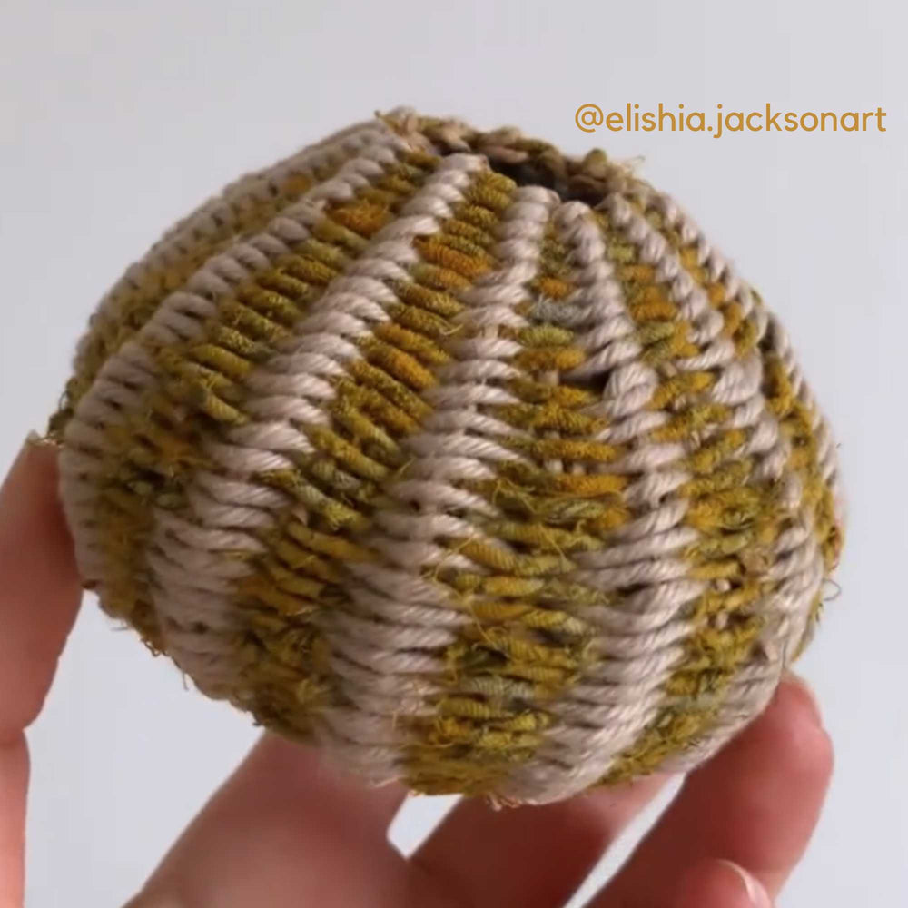 
                      
                        hand woven vessel using natural hemp and upcycled sari cord. crafted by artist @elishiajacksonart
                      
                    