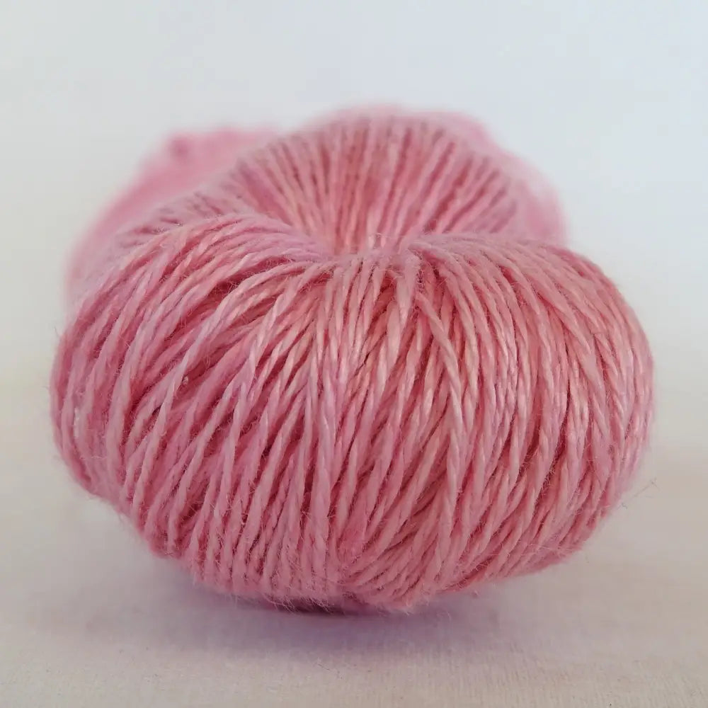 
                  
                    skein of linen yarn in camellia. Linen yarn for knitting, weaving, crochet. Natural vegan yarn for summer, baby, socks.
                  
                