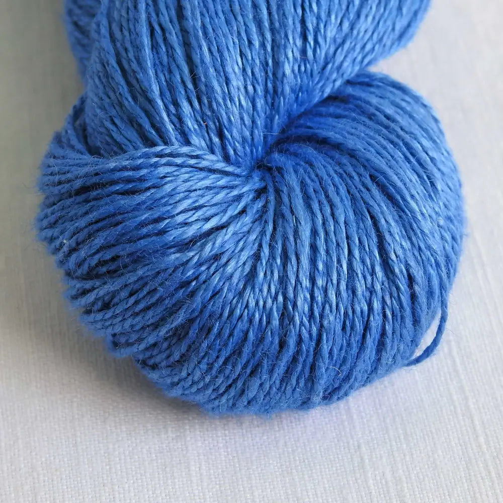 
                  
                    skein of linen yarn in classic blue. Linen yarn for knitting, weaving, crochet. Natural vegan yarn for summer, baby, socks.
                  
                