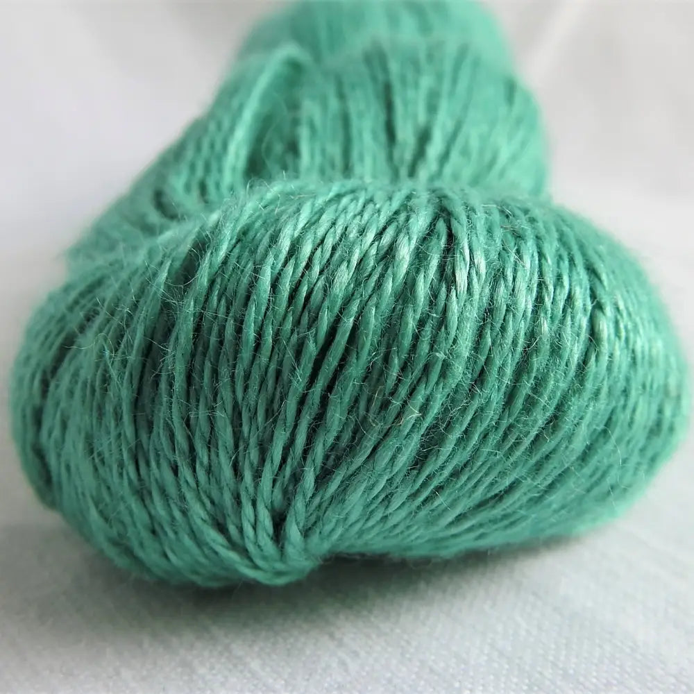 
                  
                    skein of linen yarn in deep green. Linen yarn for knitting, weaving, crochet. Natural vegan yarn for summer, baby, socks.
                  
                
