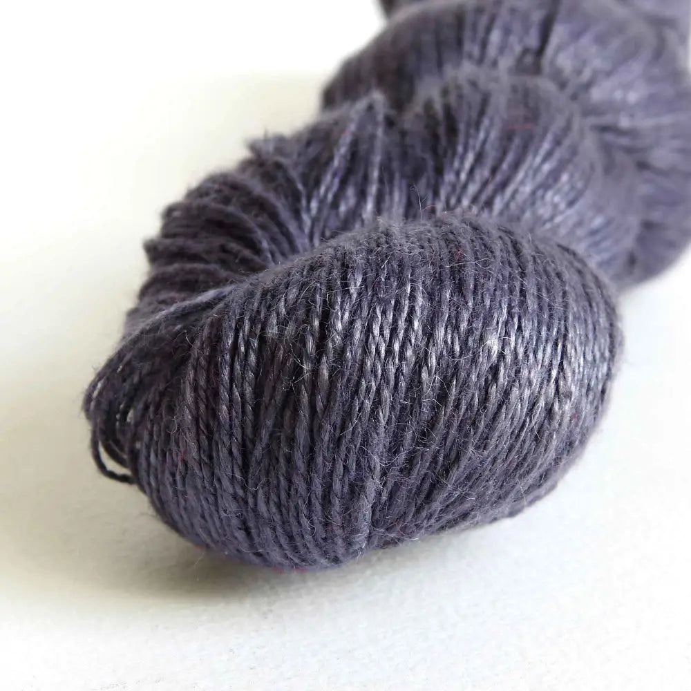 
                  
                    skein of linen yarn in sloe gin. Linen yarn for knitting, weaving, crochet. Natural vegan yarn for summer, baby, socks.
                  
                
