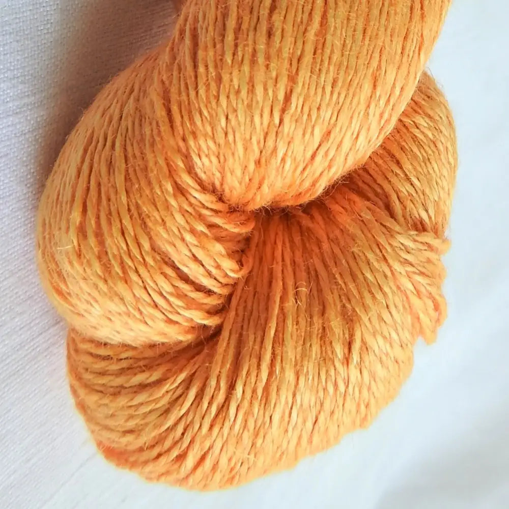 
                  
                    skein of linen yarn in tumeric. Linen yarn for knitting, weaving, crochet. Natural vegan yarn for summer, baby, socks.
                  
                
