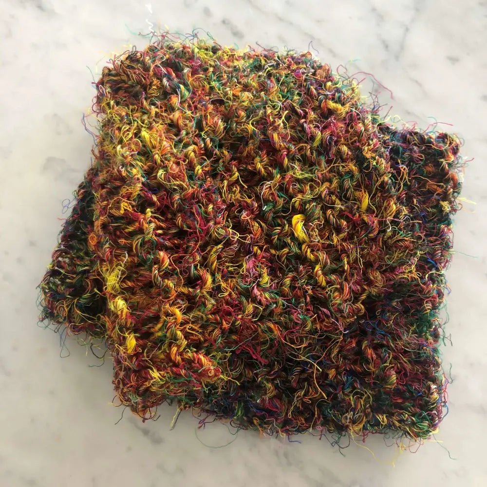 
                  
                    Knitted sample of Banana Silk in Jungle. Natural, vegan banana fiber yarn for weaving, punch needle, knitting, crochet. Soft, squishy, chunky yarn.
                  
                