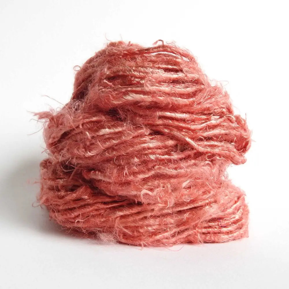 
                  
                    A ball of Banana Silk Yarn in Dusty Rose. Natural, vegan banana fiber yarn for weaving, punch needle, knitting, crochet. Soft, squishy, chunky yarn.
                  
                