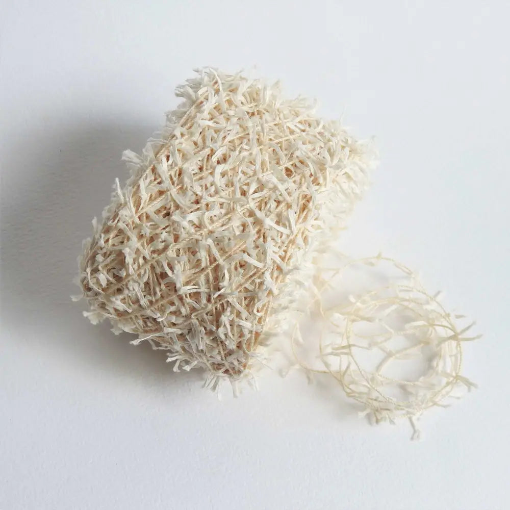 
                  
                    A Ball of Habu Textiles Cotton Cork Chenille Yarn in Natural. Soft, fluffy, cotton yarn for baby, scarves, garments, toys. Knitting, crochet, weaving yarn. Natural cotton vegan yarn. Habu yarn A-25
                  
                