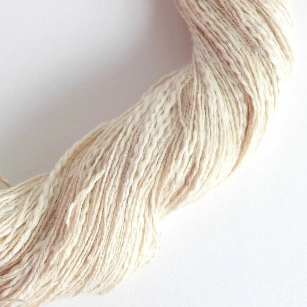 
                  
                    Skein of organic natural Cotton yarn. Cotton yarn is super soft with a slight slub for texture. Cotton knitting yarn Australia in off white. For knitting, weaving and crochet
                  
                