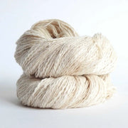 Skein of organic natural Cotton yarn. Cotton yarn is super soft with a slight slub for texture. Cotton knitting yarn Australia in off white. For knitting, weaving and crochet