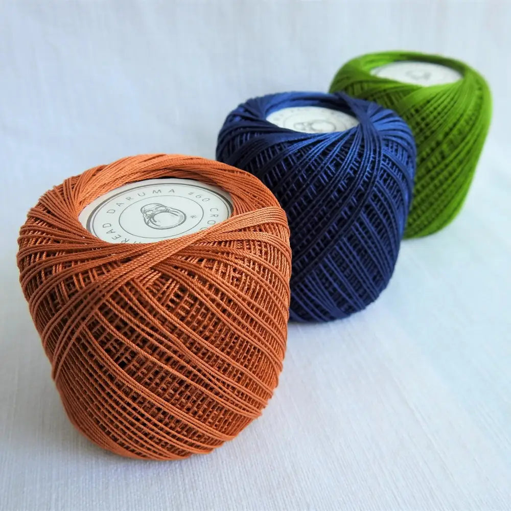 
                  
                    Balls of Cotton Crochet Thread size 60 in Persimmon, Indigo and Matcha. Cotton crochet yarn Australia for jewelry, mats. Natural cotton. Vegan yarn. Size 60 crochet thread ball. Daruma Yokota Japanese Crochet Thread
                  
                