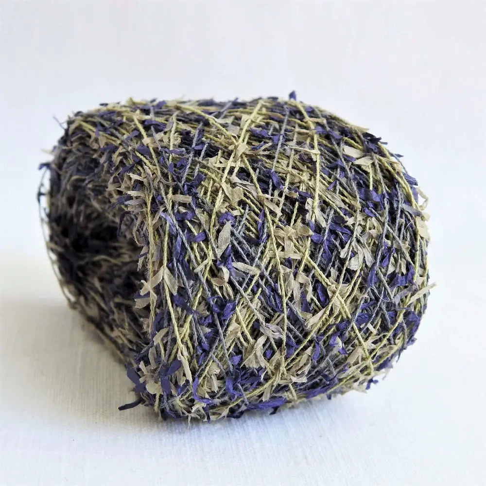
                  
                    Kasuri Cotton Paper Moire Yarn group including Blue/Purple. Japanese Lace yarn in ball for weaving, knitting and crochet. Artisan, specialty yarn to create garments, jewelry, bags, scarves, shawls and wraps with this soft yarn. Knit, crochet and weave. Habu Textiles N-78c
                  
                