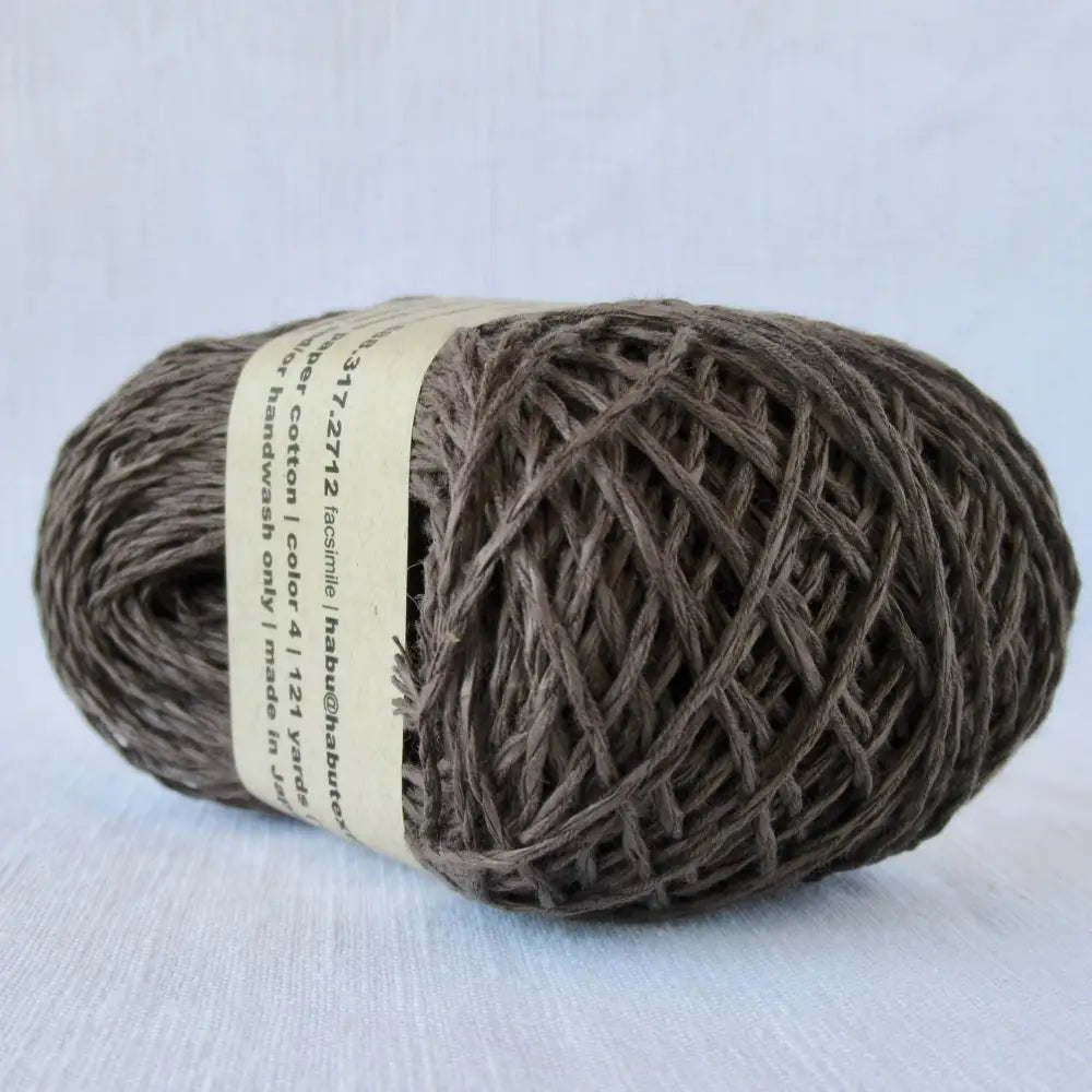 
                  
                    Balls of Habu Linen Cotton Paper Yarn  in Brown. Use for weaving, knitting and crochet. Create garments, hats, bags, baby clothes. Natural vegan yarn. Use for warp yarn when weaving. Habu yarn A-188
                  
                