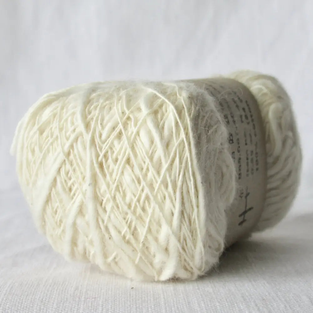 Ball of Habu Textiles NErimaki Cotton Slub Yarn. Soft cotton slub for baby, garments, scarves, gloves, mittens. Habu Textiles Nerimaki Slub N45