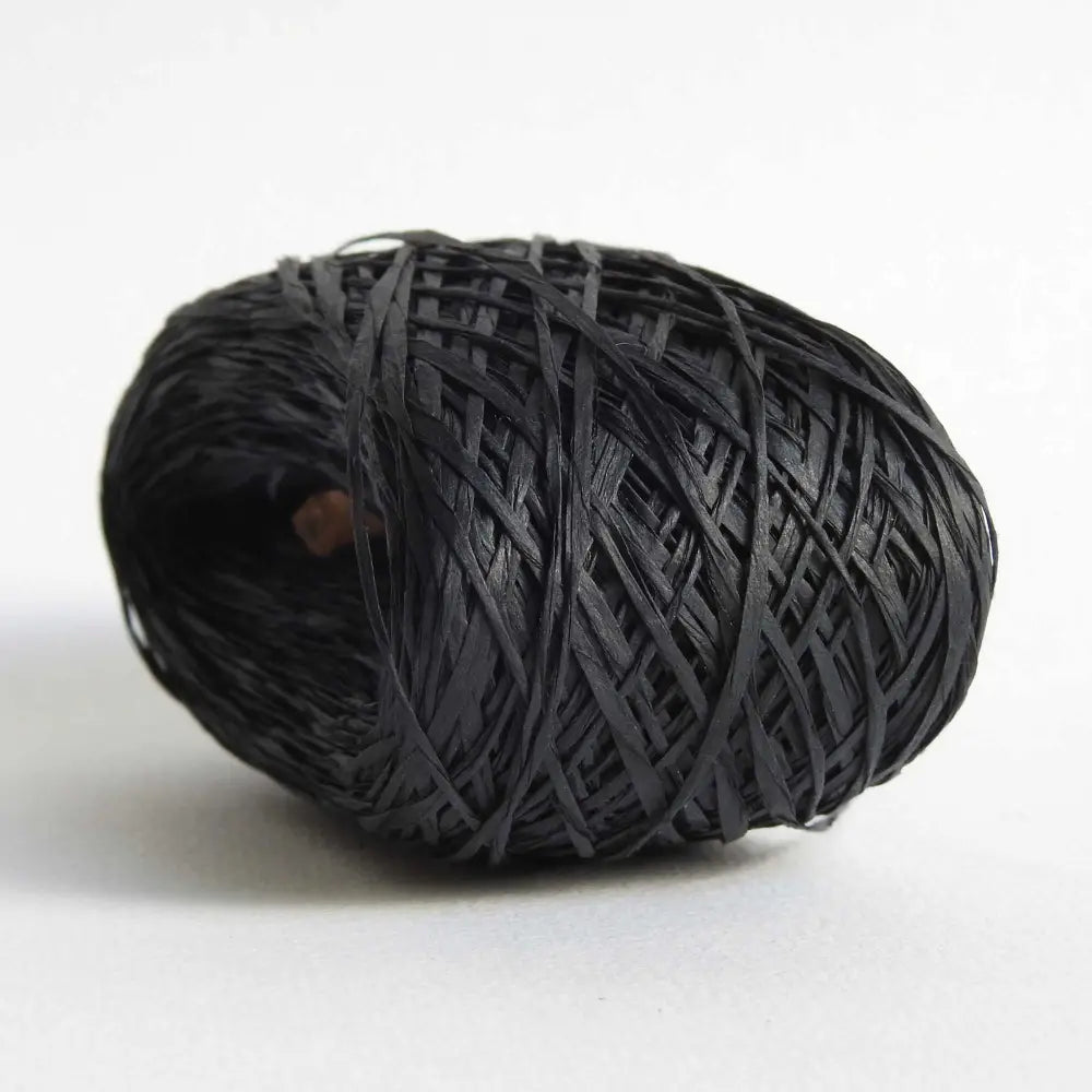 
                  
                    ball of habu textiles raw silk wrapped paper yarn in charcoal. Japanese paper yarn for weaving, crochet, knitting. Habu Textiles Raw Silk Wrapped Paper Yarn N-24b
                  
                