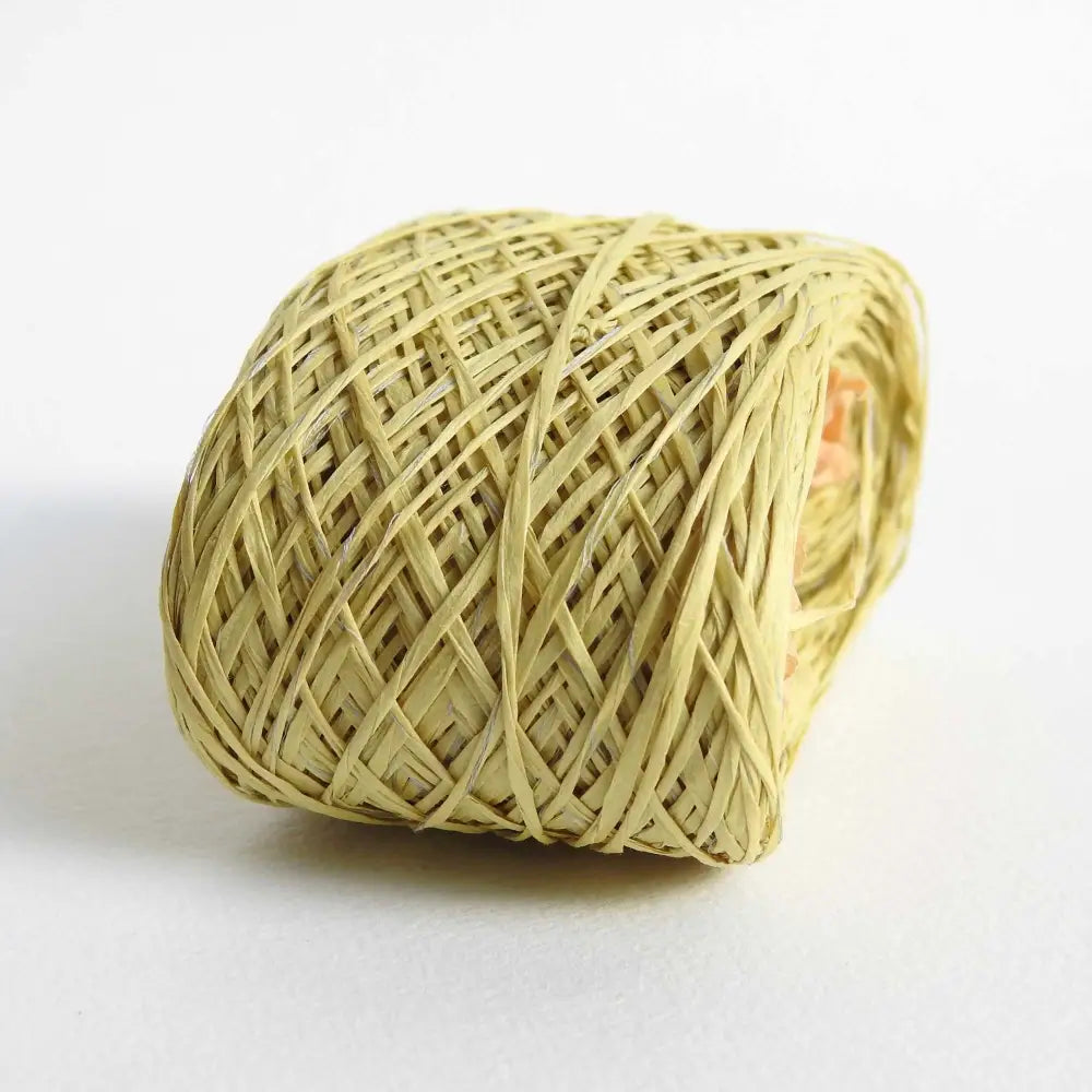 
                  
                    ball of habu textiles raw silk wrapped paper yarn in yellow green. Japanese paper yarn for weaving, crochet, knitting. Habu Textiles Raw Silk Wrapped Paper Yarn N-24b
                  
                