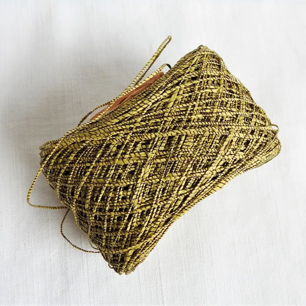 
                  
                    Ball of Habu Textiles paper yarn in mustard. Silk wrapped paper yarn for weaving, crochet, knitting. Create jewellery, clothiing. textile art. Habu linen paper yarn. Habu Textiles Silk Wrapped Paper Yarn N-94
                  
                