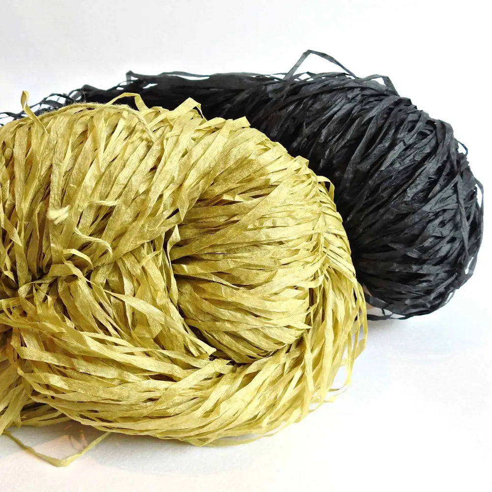 
                  
                    Large skeins of Habu Textiles Shosenshi Linen Paper yarn in Tea Green and Charcoal. Japanese Paper yarn for weaving, knitting, crochet, textile arts, machine knitting.  Linen Paper Yarn.
                  
                