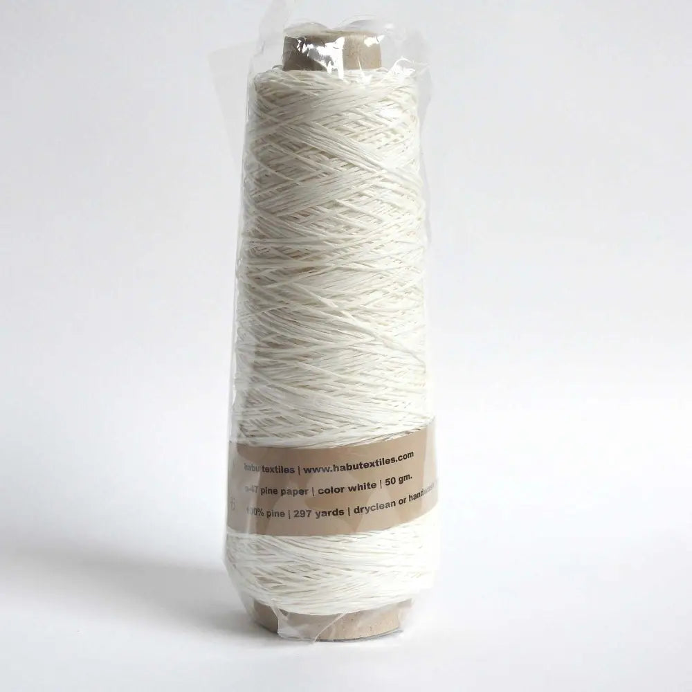 
                  
                    A cone of Habu Textiles Pine Paper yarn. This paper yarn is made from 100% pine and is suitable for knitting, crochet and weaving. Natural colour. Habu Textiles Pine Paper Yarn A-47
                  
                