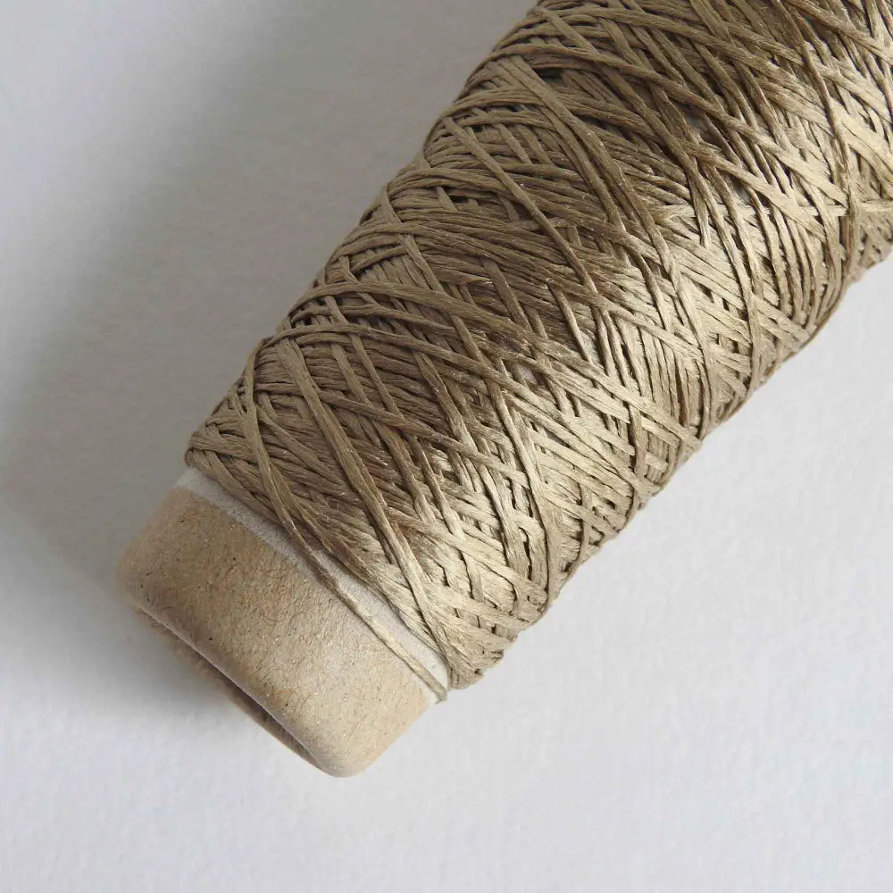 
                  
                    Habu Textiles Silk Ribbon yarn in Camel. 100% Raw Silk thread on cone. Pure Silk yarn for knitting crochet weaving jewelry tassels embroidery. Habu Textiles N106
                  
                