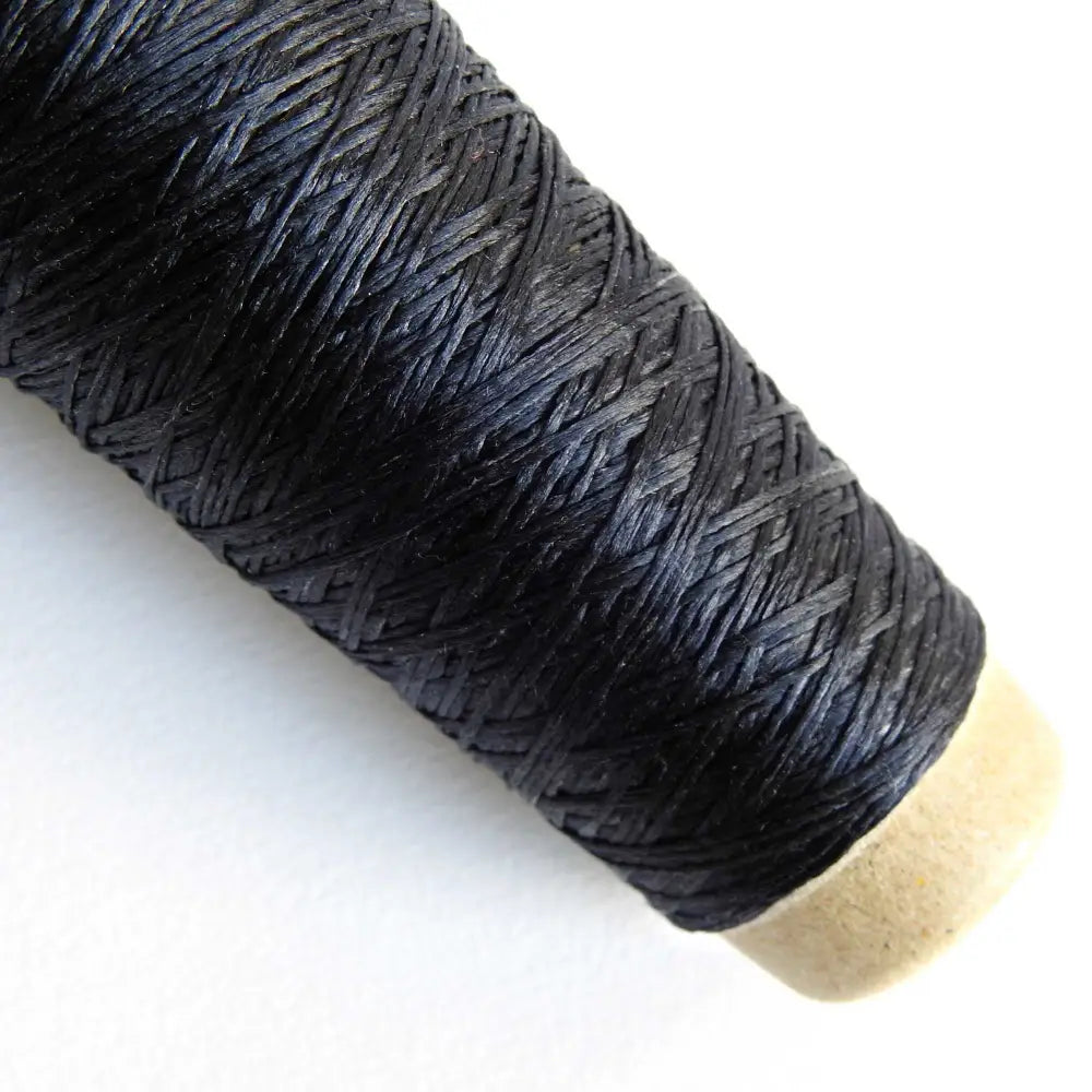 
                  
                    Habu Textiles Silk Ribbon yarn in Charcoal. 100% Raw Silk thread on cone. Pure Silk yarn for knitting crochet weaving jewelry tassels embroidery. Habu Textiles N106
                  
                