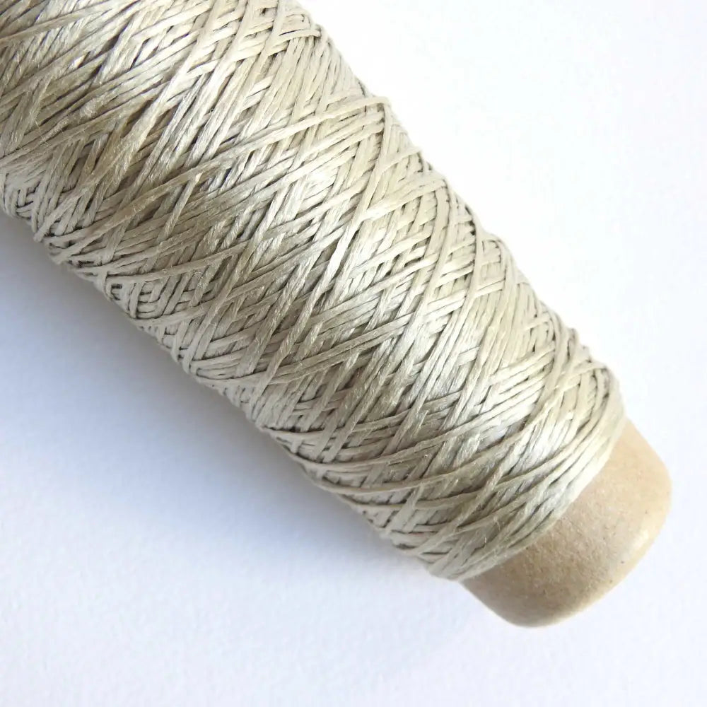 
                  
                    Habu Textiles Silk Ribbon yarn in Natural. 100% Raw Silk thread on cone. Pure Silk yarn for knitting crochet weaving jewelry tassels embroidery. Habu Textiles N106
                  
                