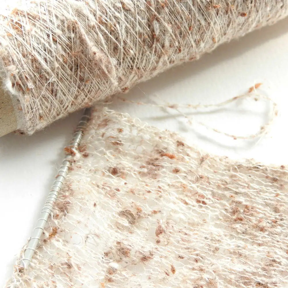 
                  
                    Knitted sample using Habu Textiles Lace Weight Silk Yarn with Fern Cotton. Japanese Silk Yarn for embroidery, weaving, knitting, textiles. Habu Silk Yarn for embroidery, jewelry, shawls. Lace weight knitting yarn. Habu Textiles Fiddlehead Fern Silk Yarn AK-20
                  
                