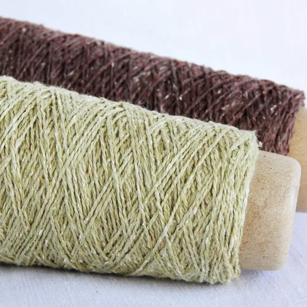 
                  
                    Habu Tsumugi Silk Yarn in Mint and Chocolate. Japanese Slub Silk on cone for weaving, knitting and crochet. Create beautiful, soft garments, jewelry, bags, scarves, shawls and wraps. Lace yarn with texture. Habu Textiles A-1
                  
                
