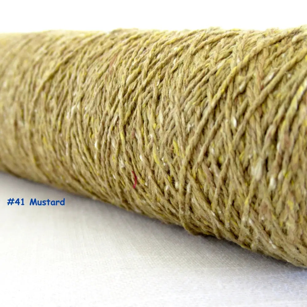 
                  
                    Habu Tsumugi Silk Yarn in White, Mustard. Japanese Slub Silk on cone for weaving, knitting and crochet. Create beautiful, soft garments, jewelry, bags, scarves, shawls and wraps. Lace yarn with texture. Habu Textiles A-1
                  
                