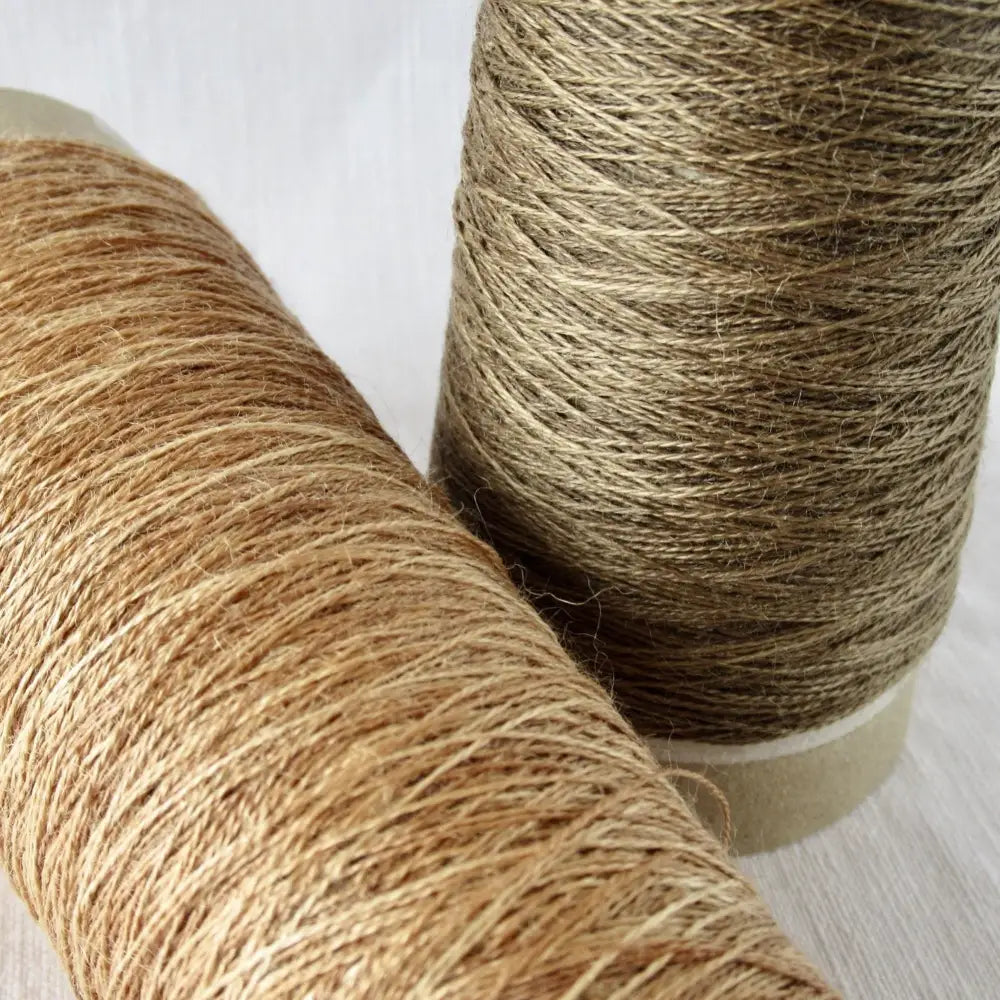 
                  
                    Kakishibu Ramie Lace Yarn in Bengarra and Charcoal. Japanese Lace yarn on cone for weaving, knitting and crochet. 100% Ramie. Create garments, jewelry, bags, scarves, shawls and wraps with this natural yarn. Habu Textiles A-13
                  
                