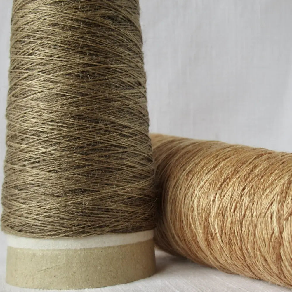 
                  
                    Kakishibu Ramie Lace Yarn in Bengarra and Charcoal. Japanese Lace yarn on cone for weaving, knitting and crochet. 100% Ramie. Create garments, jewelry, bags, scarves, shawls and wraps with this natural yarn. Habu Textiles A-13
                  
                