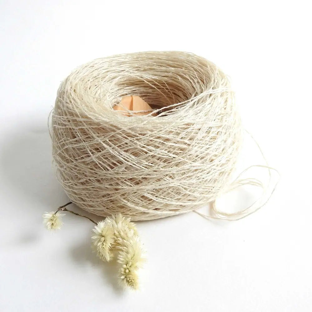 
                  
                    Ball of Habu Textiles Kibiso Silk yarn. Silk yarn for weaving, knitting, textile arts. Sculptural finish. Natural silk yarn from waste silk. Habu Textiles Kibiso Silk N63b
                  
                