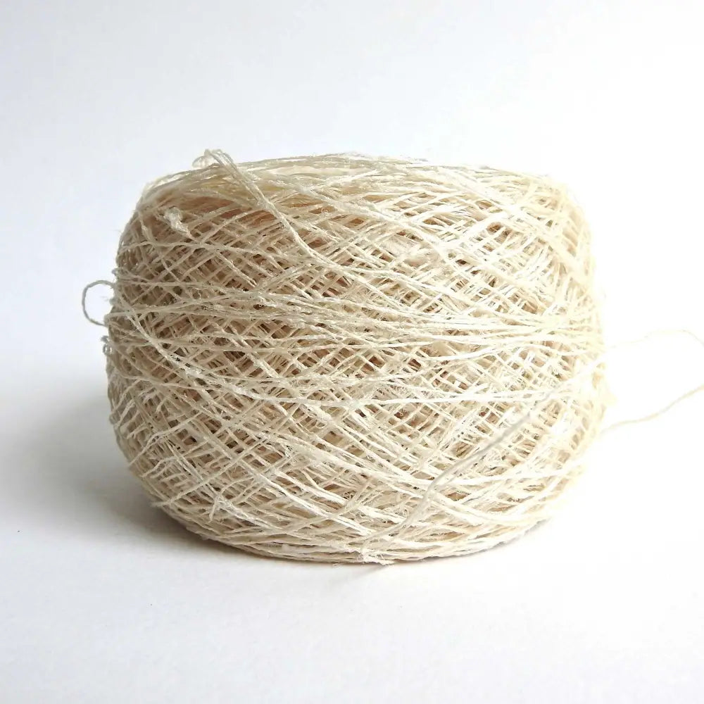 Ball of Habu Textiles Kibiso Silk yarn. Silk yarn for weaving, knitting, textile arts. Sculptural finish. Natural silk yarn from waste silk. Habu Textiles Kibiso Silk N63b