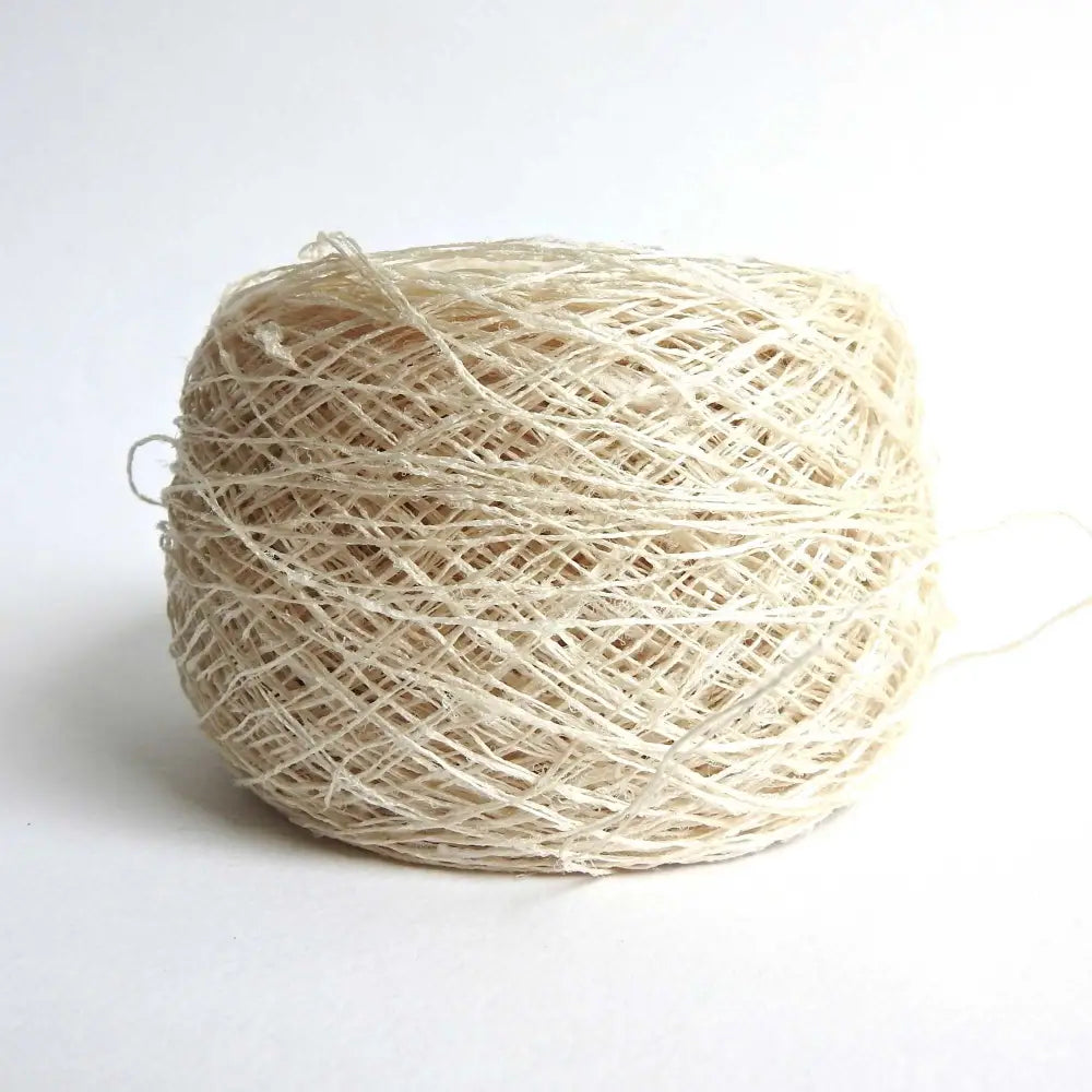 
                  
                    Ball of Habu Textiles Kibiso Silk yarn. Silk yarn for weaving, knitting, textile arts. Sculptural finish. Natural silk yarn from waste silk. Habu Textiles Kibiso Silk N63b
                  
                