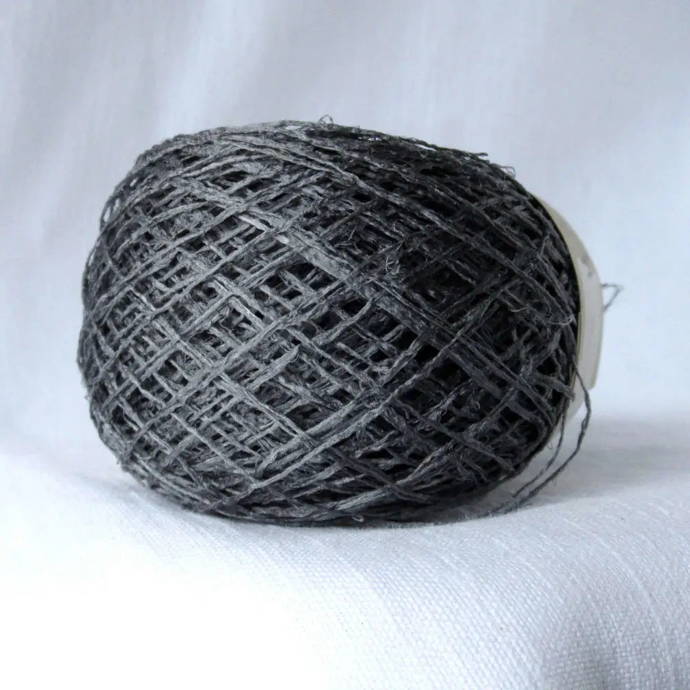
                  
                    Kibiso Natural Silk Yarn in Charcoal. Japanese Lace yarn in ball for weaving, knitting and crochet. Artisan, specialty yarn with texture to create garments, jewelry, bags, scarves, shawls and wraps with this soft yarn. Knit, crochet and weave. Habu Textiles N-63b
                  
                