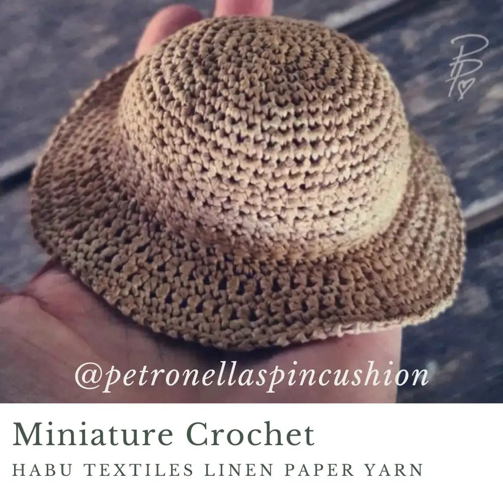 
                  
                    Minature crochet hat by @petronellascushion using Habu Textiles Linen Paper yarn. Yarn has been dyed with onion skins
                  
                