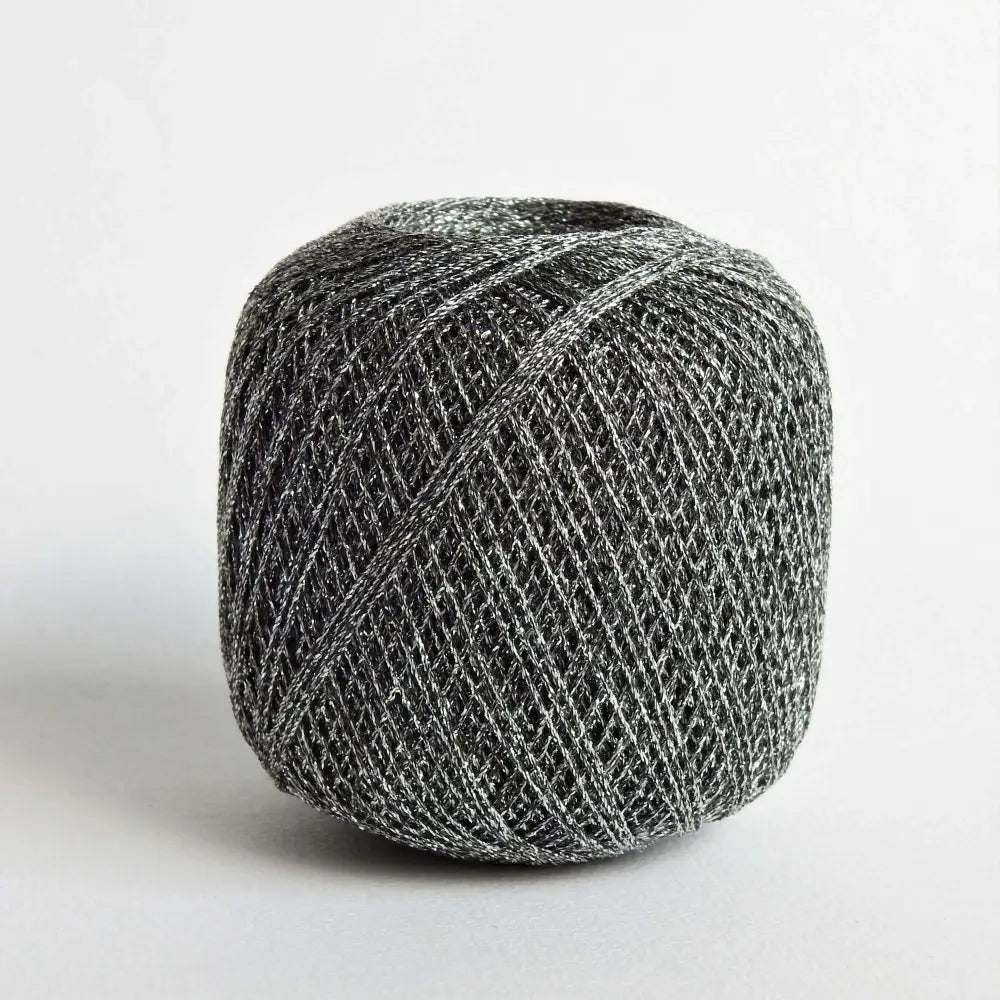 
                  
                    Ball of metallic yarn in black silver. Glitter yarn, soft and shiny yarn with beautiful drape. Lurex metallic yarn for crochet, knitting, tatting, weaving, tassels and embroidery. Daruma Lurex Lame Leaf thread
                  
                