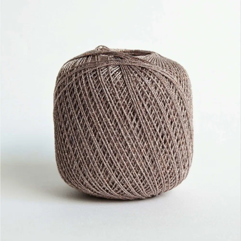 
                  
                    Ball of metallic yarn in copper. Glitter yarn, soft and shiny yarn with beautiful drape. Lurex metallic yarn for crochet, knitting, tatting, weaving, tassels and embroidery. Daruma Lurex Lame Leaf thread
                  
                