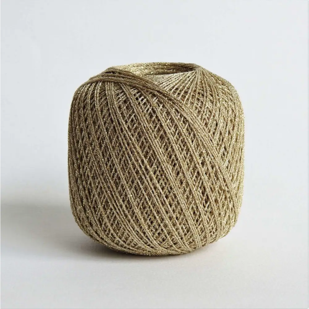 
                  
                    Ball of metallic yarn in gold. Glitter yarn, soft and shiny yarn with beautiful drape. Lurex metallic yarn for crochet, knitting, tatting, weaving, tassels and embroidery. Daruma Lurex Lame Leaf thread
                  
                