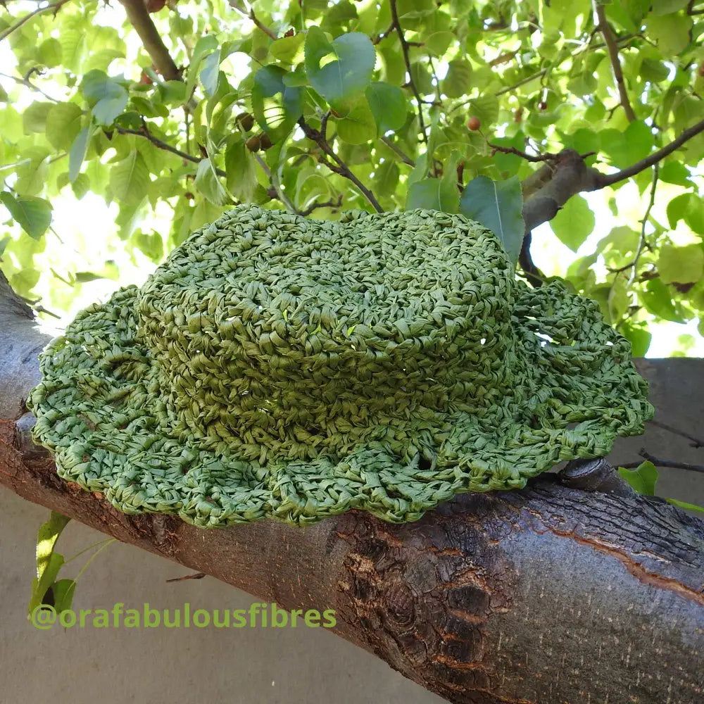 
                  
                    Summer hat crocheted using Raffia yarn in Green crafted by @orafabulousfibres. Natural soft raffia for baskets, hats, bags and mats. Hat crocheted using Daruma Raffia Ribbon in Green. Vegan, eco friendly coloured raffia ribbon. Dyed raffia for hats, baskets, bags
                  
                