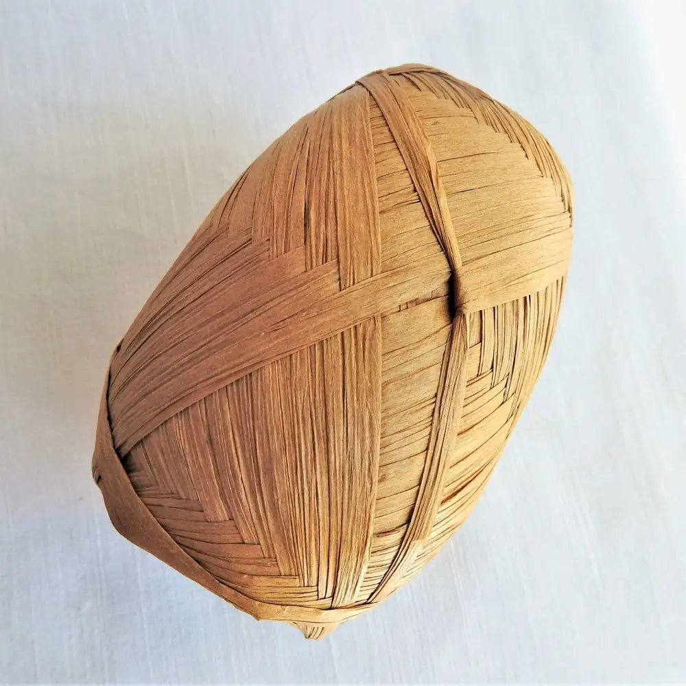 
                  
                    Ball of Raffia yarn for weaving, crochet and crafting in Brown. Natural soft raffia for baskets, hats, bags and mats. Vegan, eco friendly coloured raffia ribbon.
                  
                