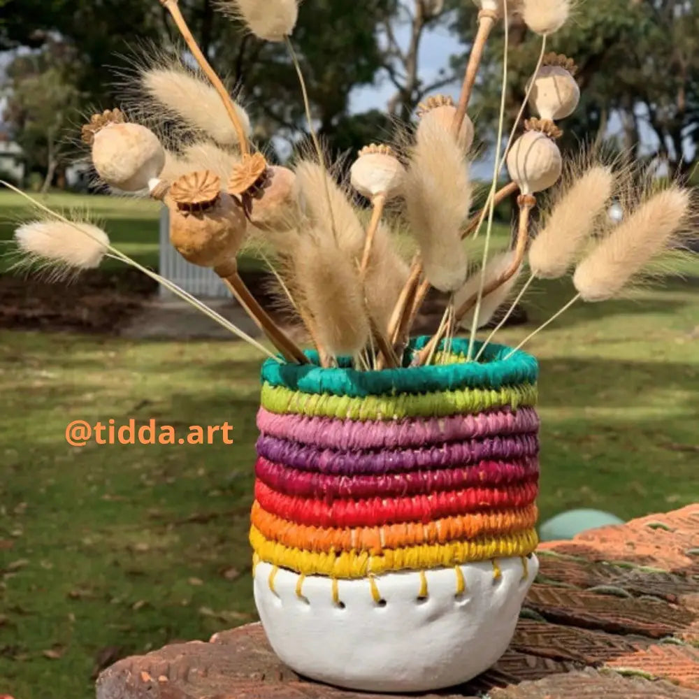 
                  
                    Raffia vessel crafted using multiple colours of Nutscene raffia by @tidda.art
                  
                