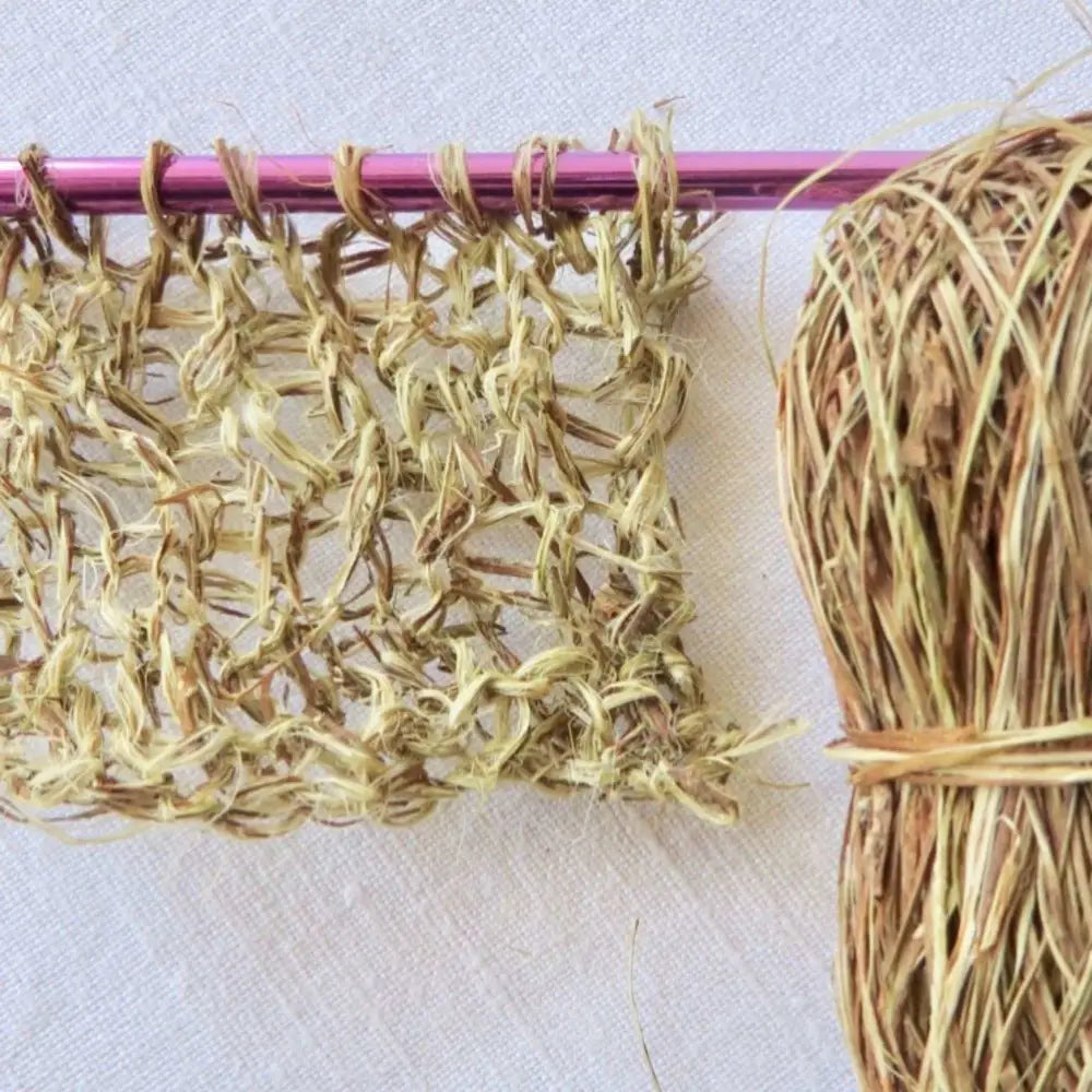 
                  
                    Ball of ramie fibre. Natural bast fibre for basket weaving, hats, bags, craft. Plant based natural yarn.  Habu Textiles Ramie AOS-44
                  
                