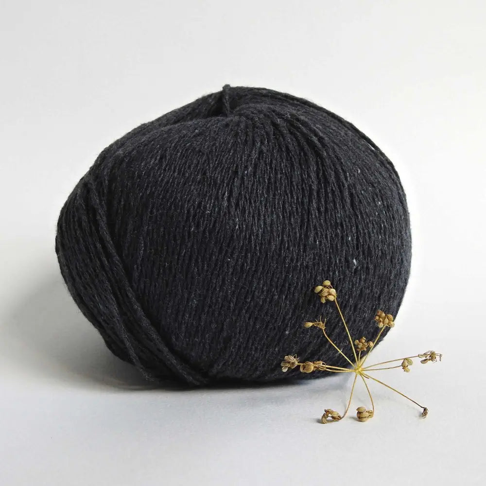 
                  
                    Ball of Chunky Cotton Yarn crafted from recycled denim jeans in colour Anthracite. Recycled yarn for sweater, scarf, beanie, hat. Natural cotton yarn. Eco Friendly vegan yarn. Pascuali Re-Jeans.
                  
                