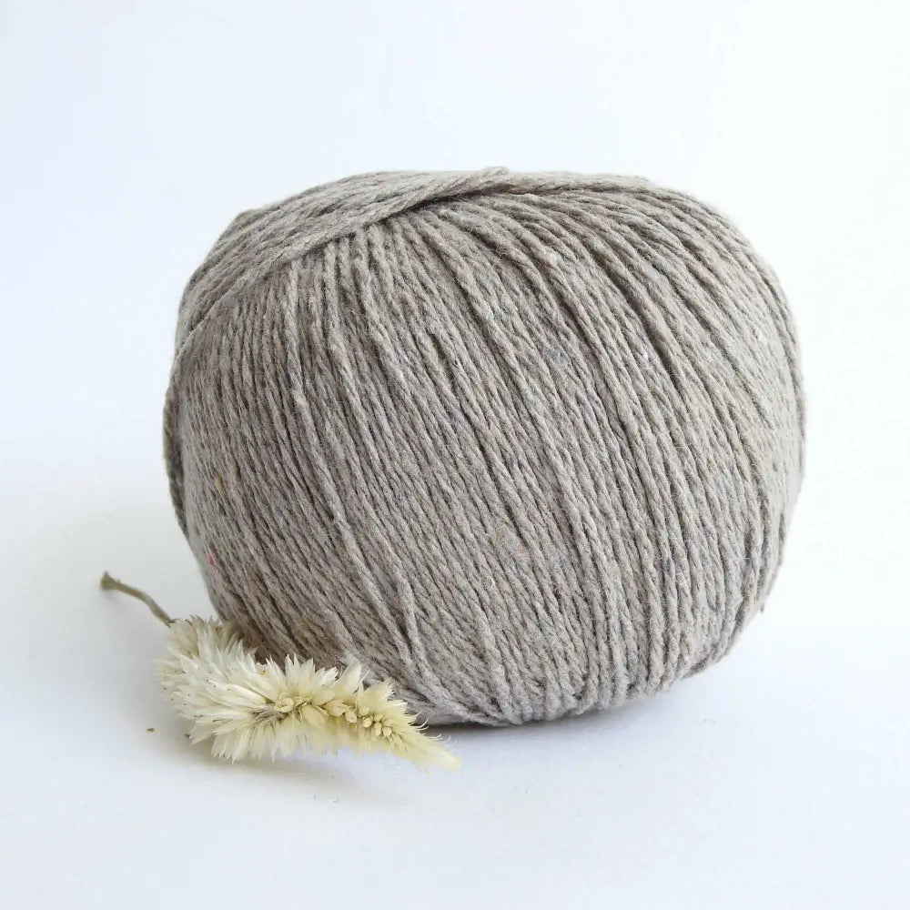 
                  
                    Ball of Chunky Cotton Yarn crafted from recycled denim jeans in colour Beige. Recycled yarn for sweater, scarf, beanie, hat. Natural cotton yarn. Eco Friendly vegan yarn. Pascuali Re-Jeans.
                  
                