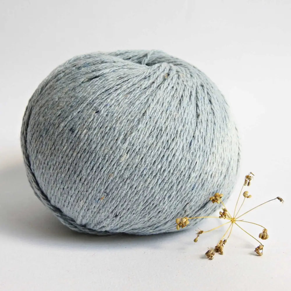 Ball of Chunky Cotton Yarn crafted from recycled denim jeans in colour Light Blue. Recycled yarn for sweater, scarf, beanie, hat. Natural cotton yarn. Eco Friendly vegan yarn. Pascuali Re-Jeans.