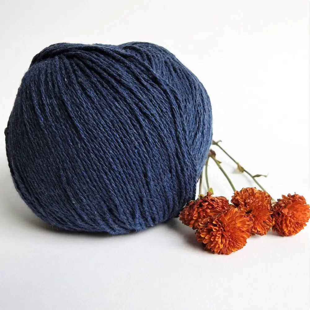 
                  
                    Ball of Chunky Cotton Yarn crafted from recycled denim jeans in colour Marine. Recycled yarn for sweater, scarf, beanie, hat. Natural cotton yarn. Eco Friendly vegan yarn. Pascuali Re-Jeans.
                  
                