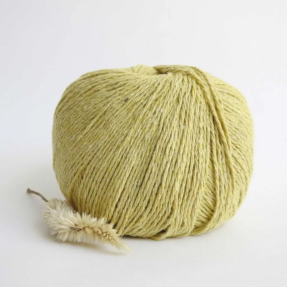 
                  
                    Ball of Chunky Cotton Yarn crafted from recycled denim jeans in colour Mustard. Recycled yarn for sweater, scarf, beanie, hat. Natural cotton yarn. Eco Friendly vegan yarn. Pascuali Re-Jeans.
                  
                
