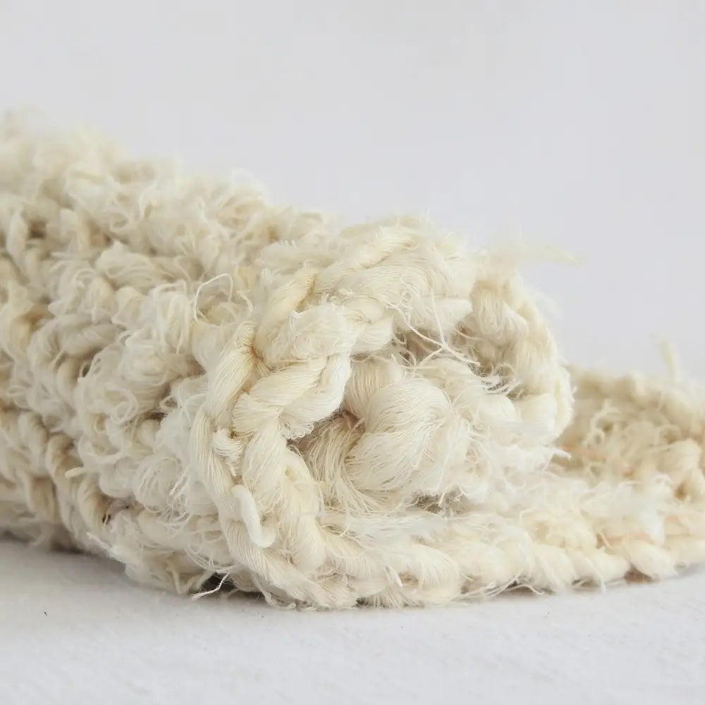 
                  
                    Knitted sample of Recycled Linen yarn in Cloud. Hand spun, soft and chunky our Linen yarn is perfect for crafting, macrame, weaving, knitting and crochet. Use to make bags, baskets, hats, scarves and sweaters. Natural yarn with wonderful drape and feel.  
                  
                